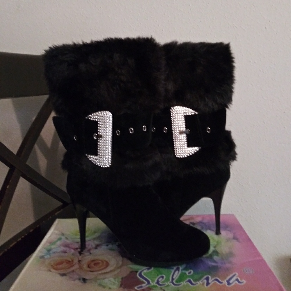 Selina fuzzy top boots.
